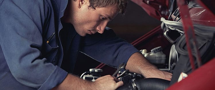 mechanic repairng car